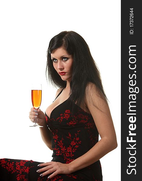 Woman in a dress drink wine