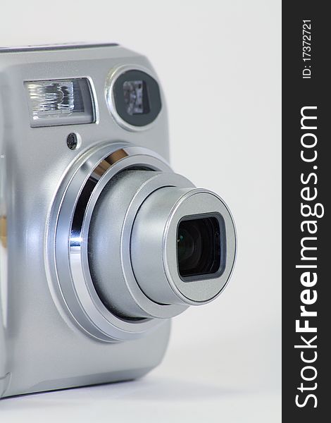 Digital Camera with Zoom Lens, white isolated background.