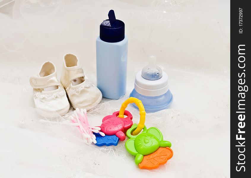 Baby's accessories, on light background