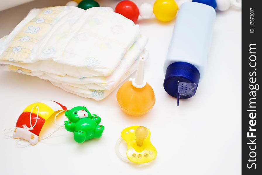 Baby's accessories, on light background