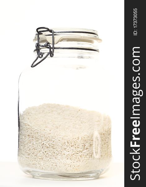 Rice in jar on white background