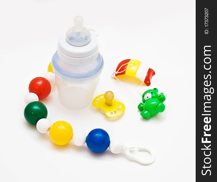 Baby's accessories, on light background