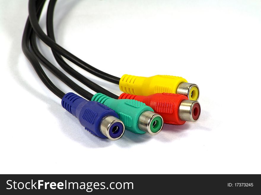 Dark blue, green, yellow and red RCA connectors for switching audio and video signals in modern electronic equipment. Dark blue, green, yellow and red RCA connectors for switching audio and video signals in modern electronic equipment