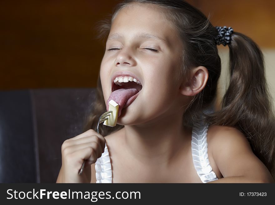 Smiling girl with cheese