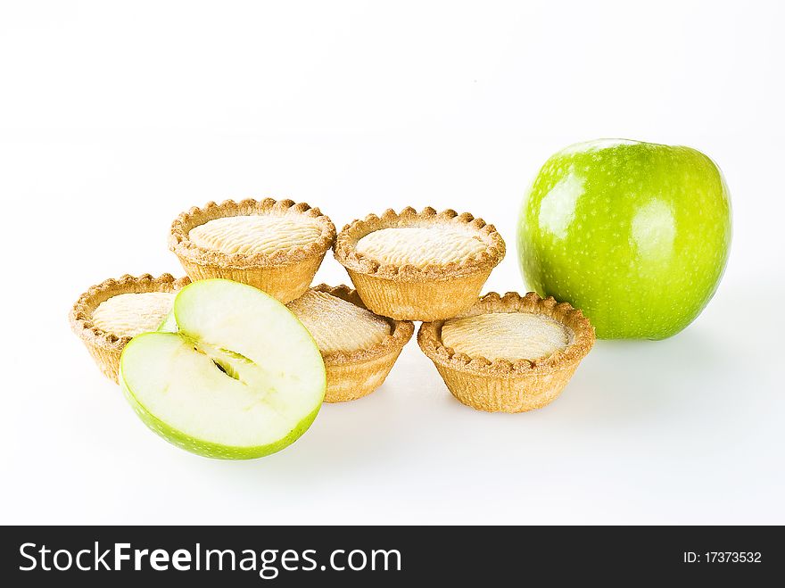 Freshly made apple pies over white background. Freshly made apple pies over white background