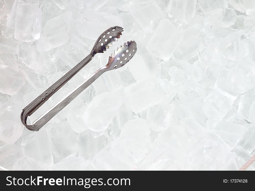 Ice   With Tongs Closeup