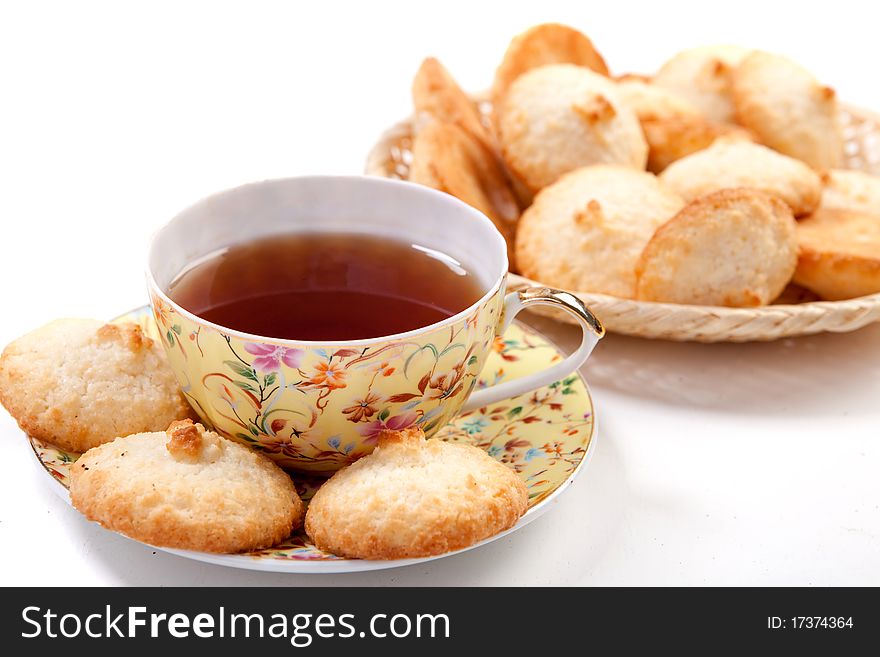 Cup of black tea with sweet baking. Cup of black tea with sweet baking