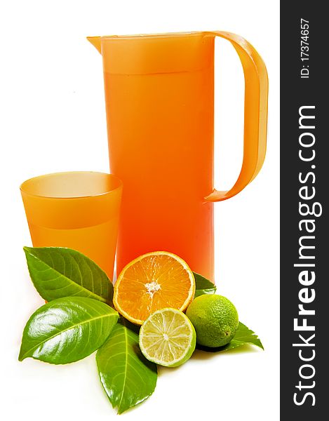 Pitcher And Glass With Orange And Lime