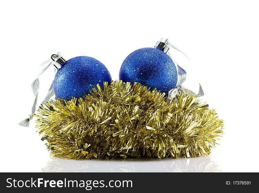 Christmas Balls and gold tinsel isolated on white. Christmas Balls and gold tinsel isolated on white