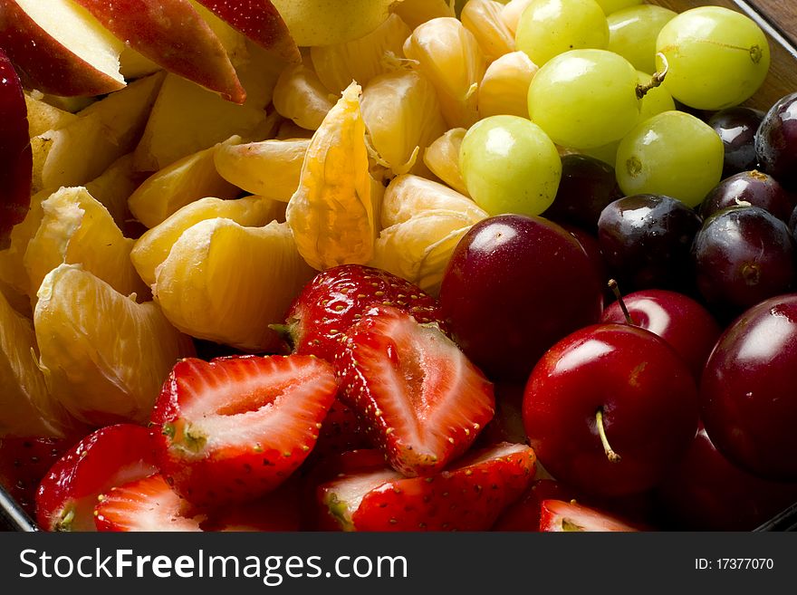 Fresh organic mixed fruitsalad with various fruits. Fresh organic mixed fruitsalad with various fruits