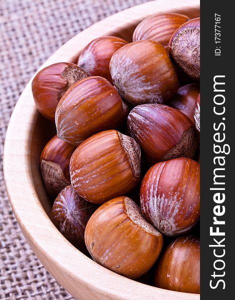 Selection of Hazelnuts in a wooden bowl