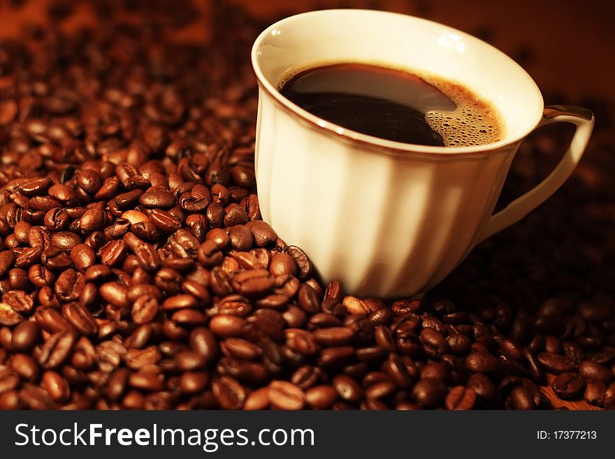 Cup of coffee on a dark background