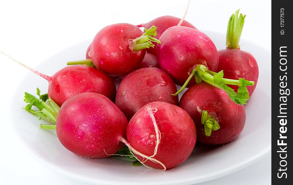 Red radish. Isolated over white background