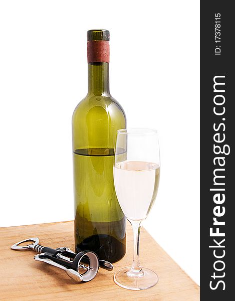 White wine bottle and glass with corkscrew over white