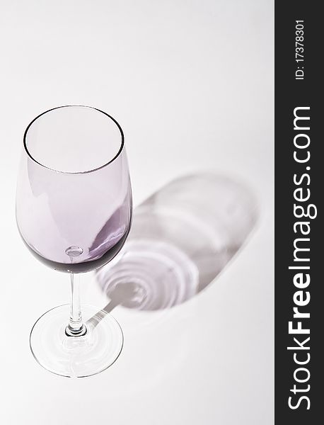Light  claret  wineglass with shadow