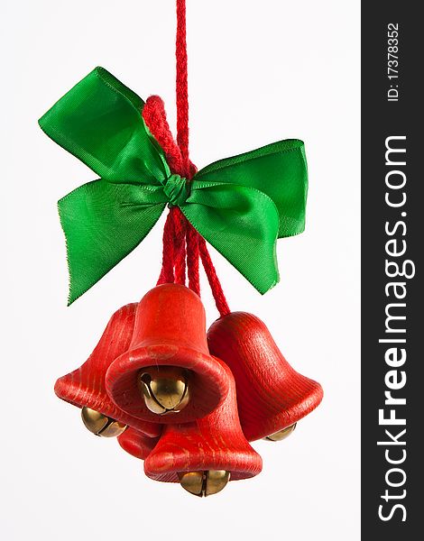 Red jingle bells with a green bow
