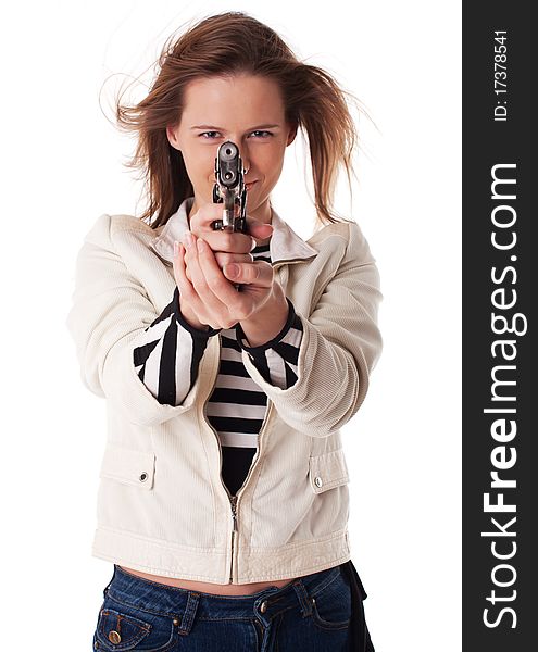 Smiling woman aiming with gun at camera