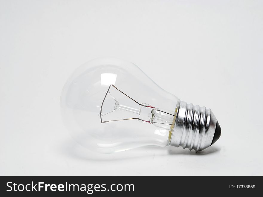Light bulb on a white background isolated. Light bulb on a white background isolated