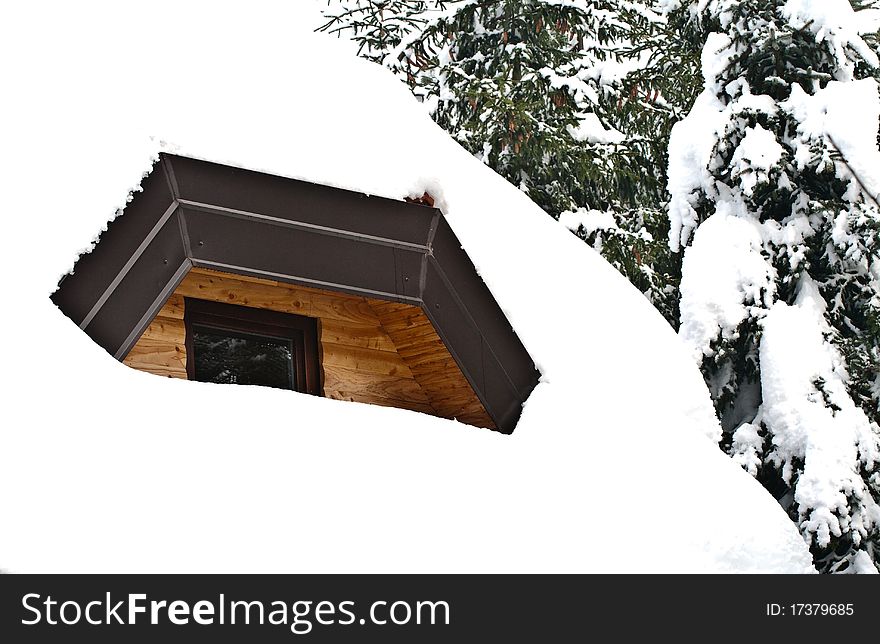 Roof and window covered with snow. Roof and window covered with snow
