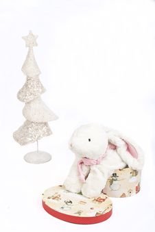 White Christmas Tree And A Toy White Rabbit Stock Photo White Christmas Tree And A Toy White Rabbit Stock Photo