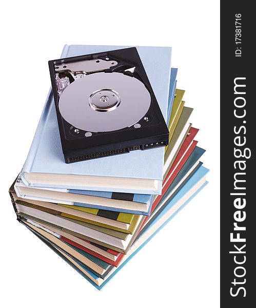 Hard drive on stack of books isolated on white. Hard drive on stack of books isolated on white
