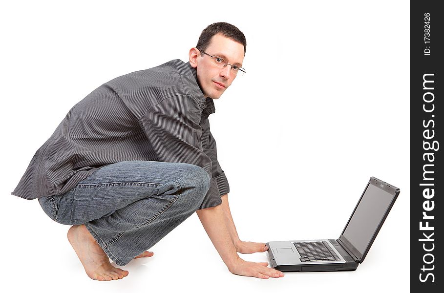 Guy with the laptop isolated on a white background
