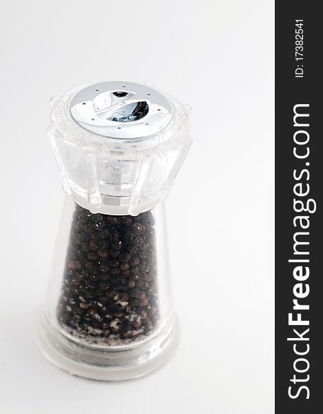 An image of a pepper and salt grinder.