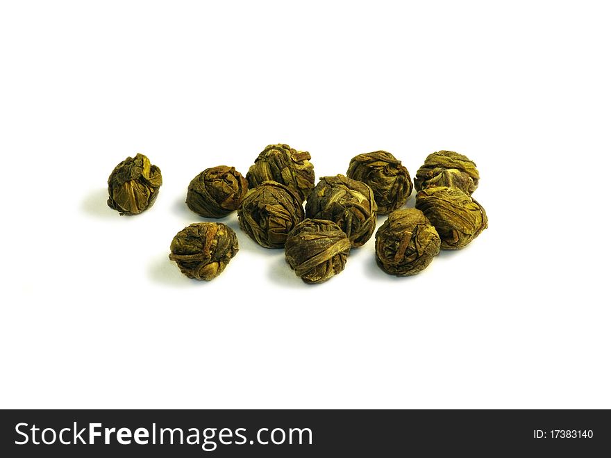 Green tea balls isolated on white background