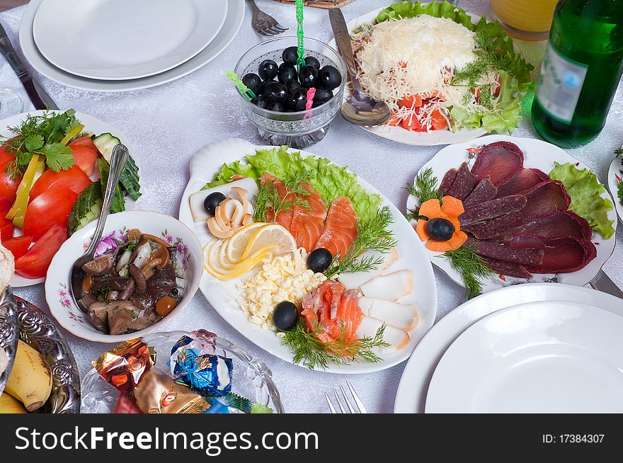 A lot of various meal on a banquet table. A lot of various meal on a banquet table.