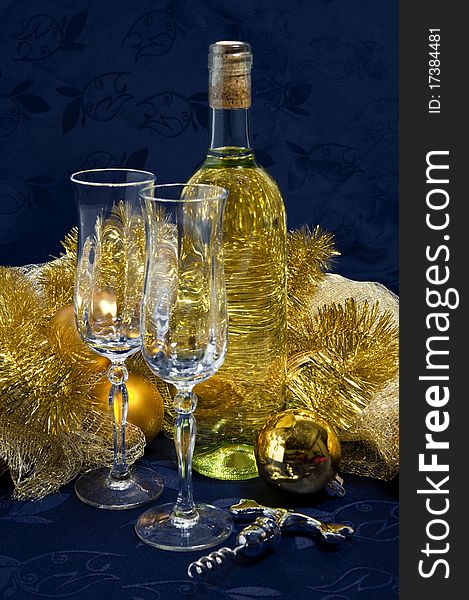 White wine glasses and corkscrews with Christmas decorations. White wine glasses and corkscrews with Christmas decorations