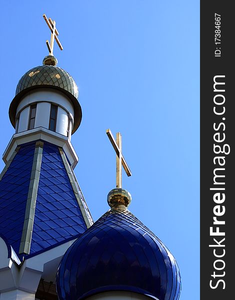 Domes of the Orthodox Church against the blue sky