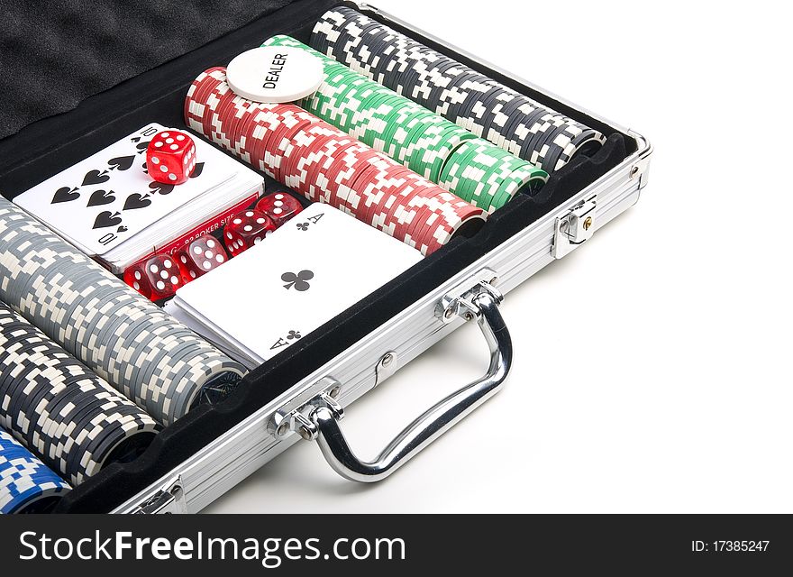 Poker set in a metallic case isolated on a white background. Close-up. Poker set in a metallic case isolated on a white background. Close-up