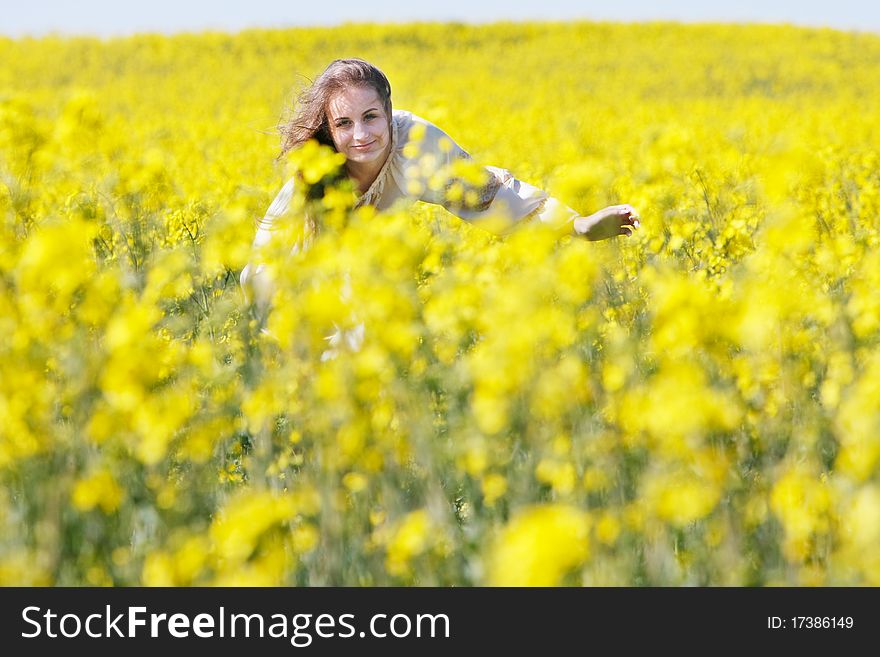 Attractive Woman In Yellow Field