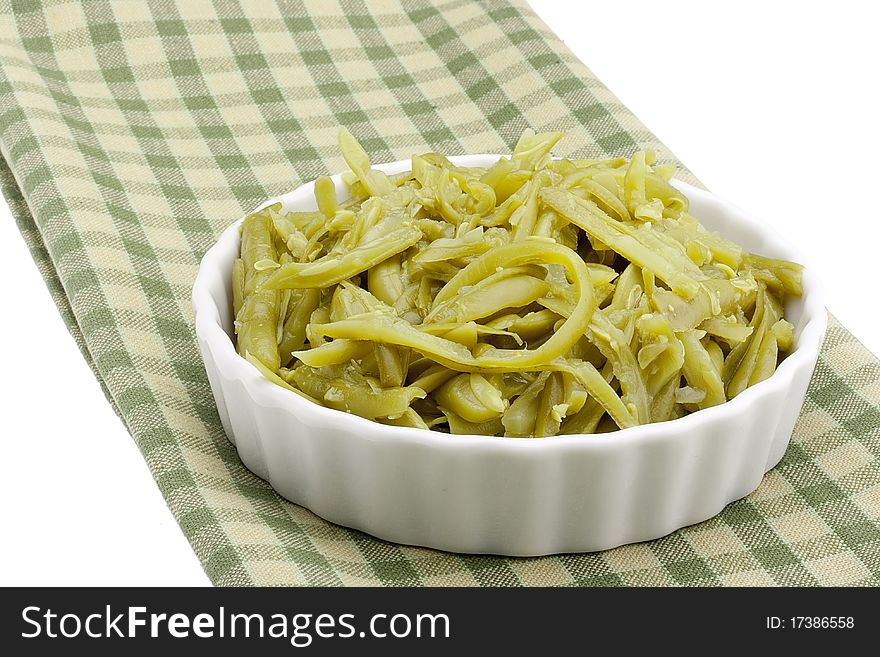 Chopped chillies marinated green beans from the metal cans.