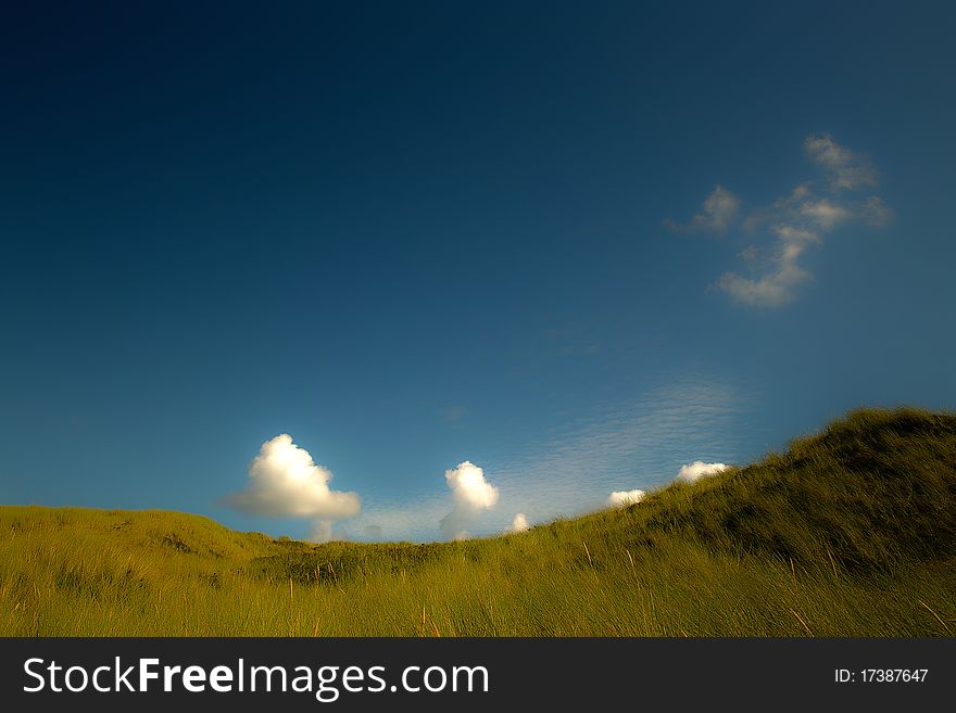 The Sky over dunes on the I land Sylt in north of Germany. The Sky over dunes on the I land Sylt in north of Germany