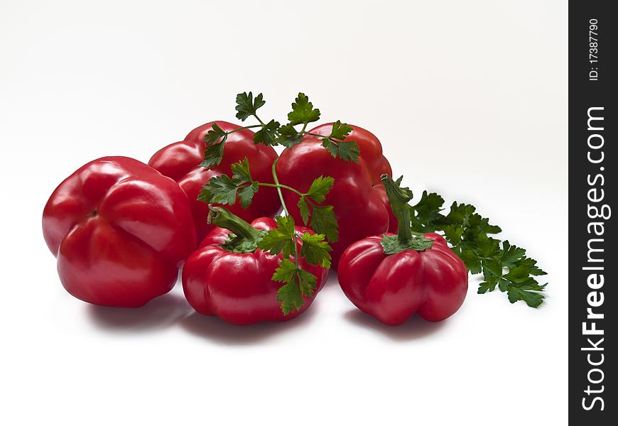 Some round red Moldavian pepper with parsley