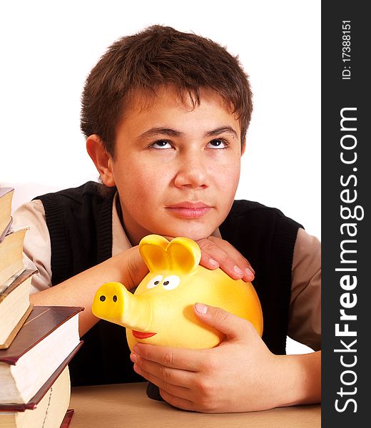 A boy and a piggy bank on white background isolated