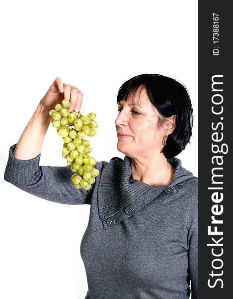 Aged Woman With Grapes