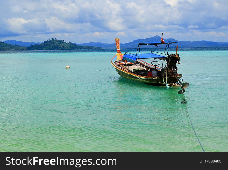 Small boat in thailand blue sky