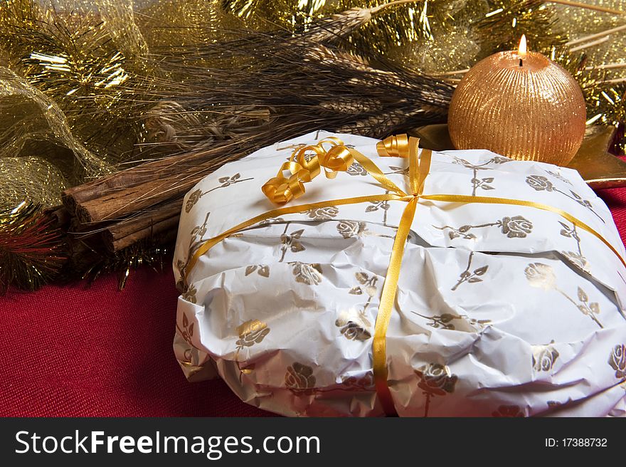 Christmas decorations and cake wrapped with a red background. Christmas decorations and cake wrapped with a red background