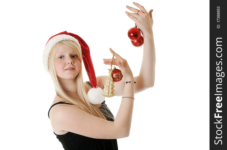 Young beautiful girl in a Santa hat on a white background