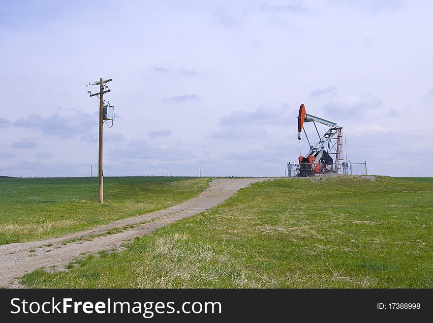 Heavy Oil being pumped in an empty field. Heavy Oil being pumped in an empty field