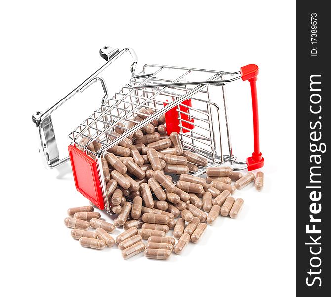 Carts on a white background filled with pills. Carts on a white background filled with pills