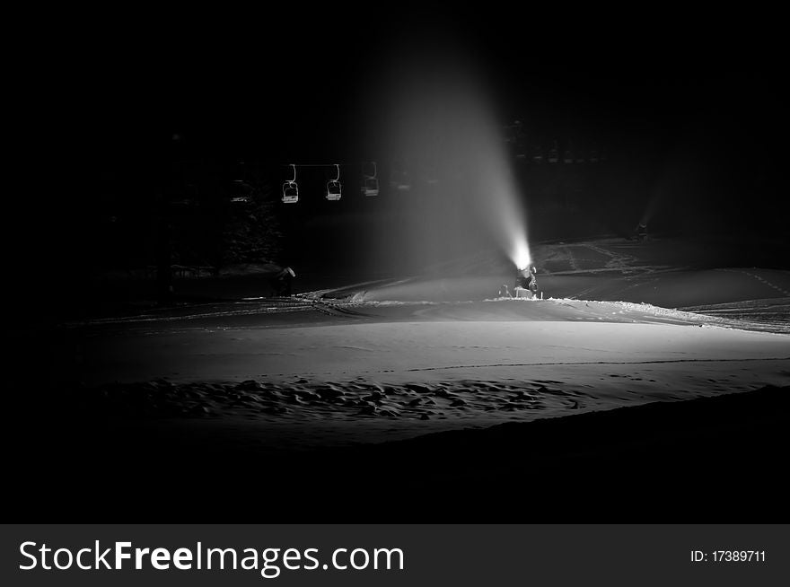 Snow gun making snow during the night