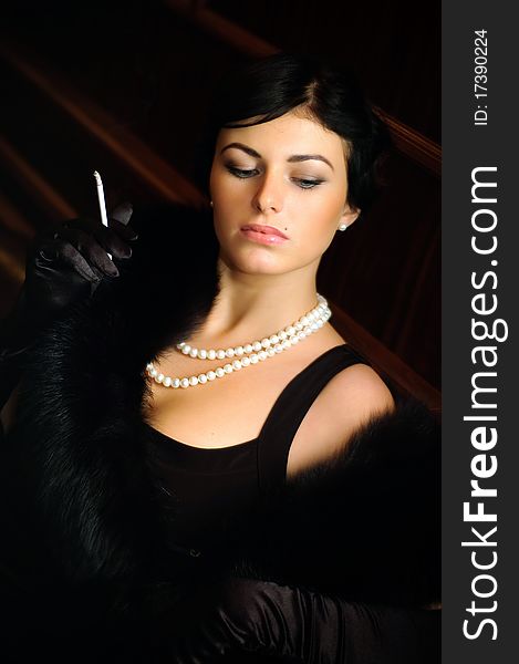 Luxurious Lady With A Cigarette. Vintage Style.