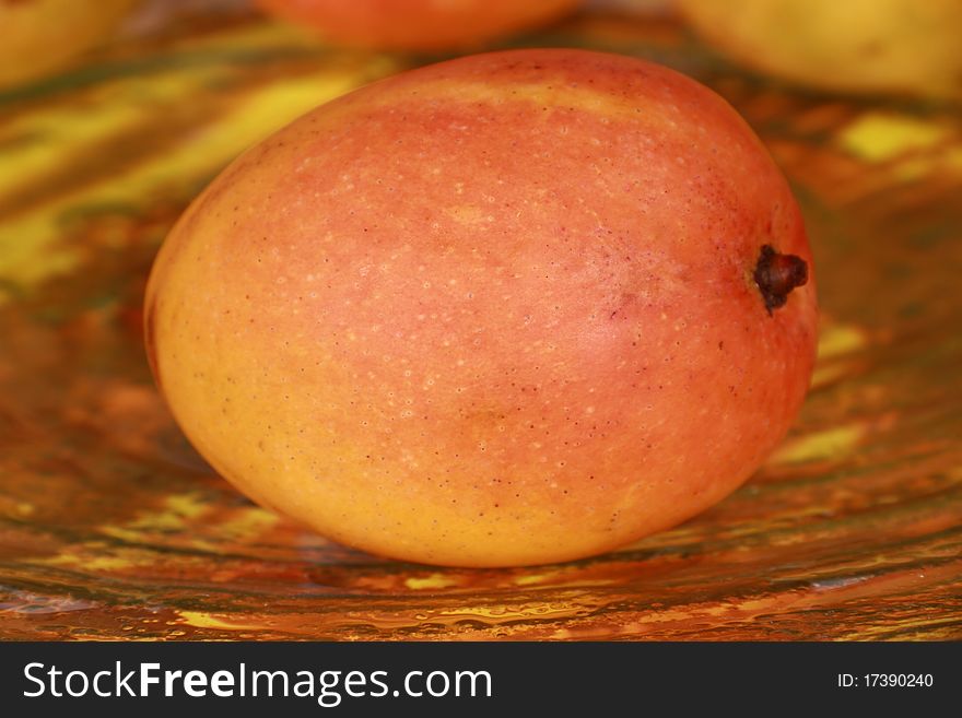 Mango one of tropical fruit on glass plate