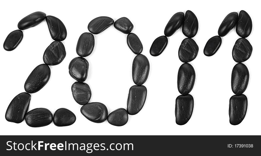 Numbers made from stones isolated on white