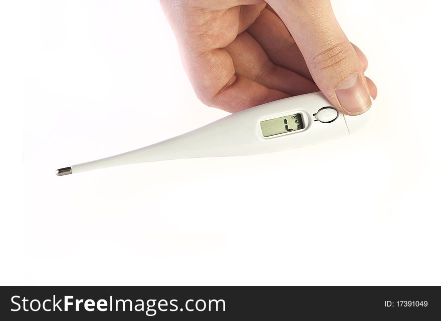 Fingers holding electronic termometer on white background