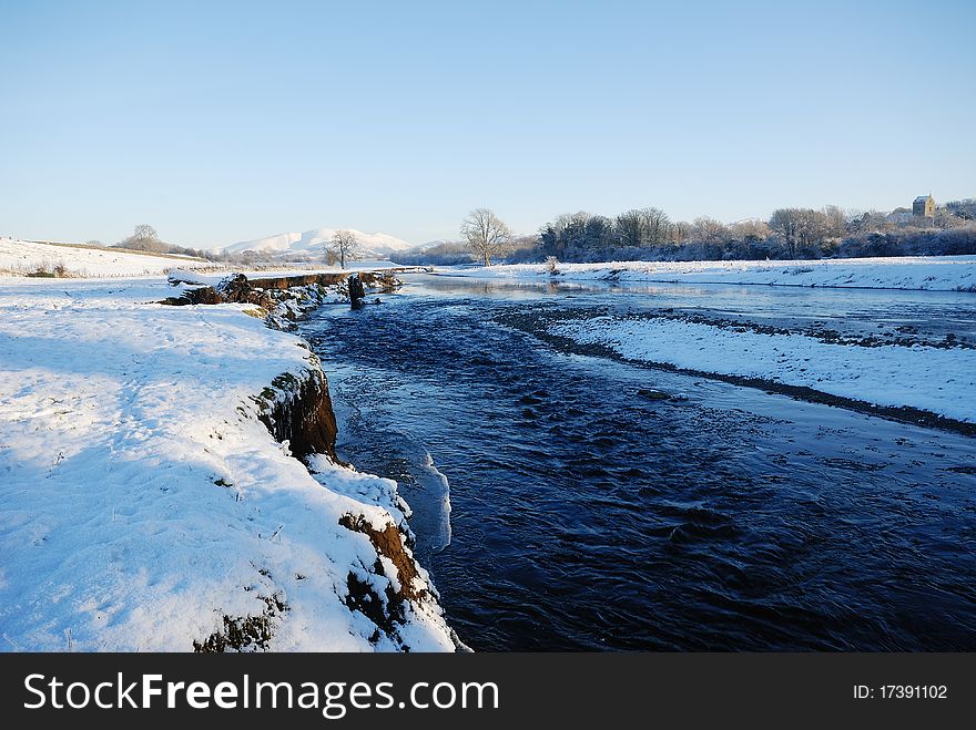 A Winter River and Snow