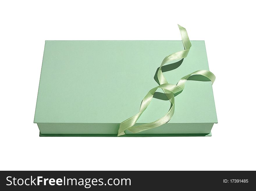 Gift box with green ribbon isolated on a white background